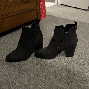 She’s 8 black boots